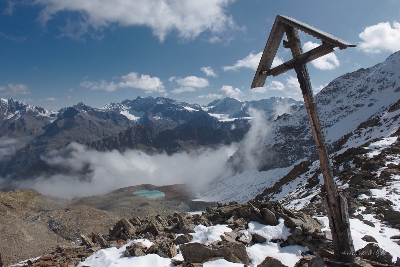 Hikers on an alpine trail above the treeline